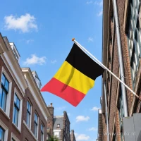 Belgische vlag aan een gevelstok