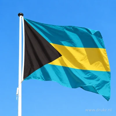 Bahamaanse vlag wapperend aan een verticale witte mast