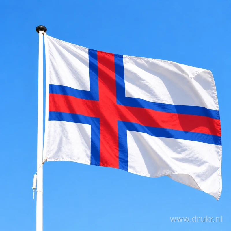 Vlag van Faeröer wapperend aan een verticale witte mast