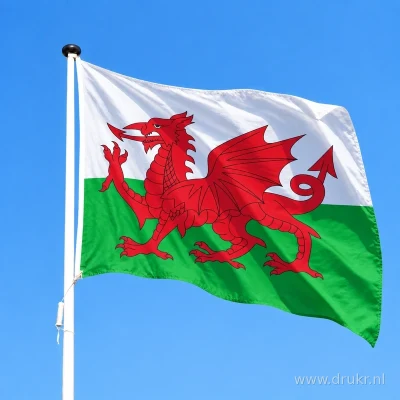 Vlag van Wales wapperend aan een verticale witte mast