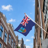 Vlag van Montserrat aan een gevelstok
