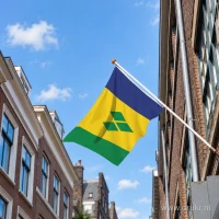 Vlag van Saint Vincent en de Grenadines aan een gevelstok