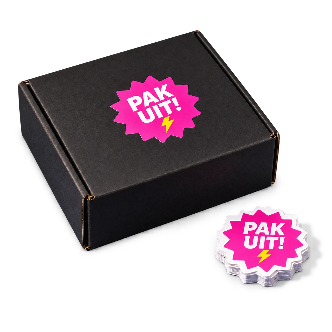 Roze sticker met de tekst Pak uit! op een zwarte doos